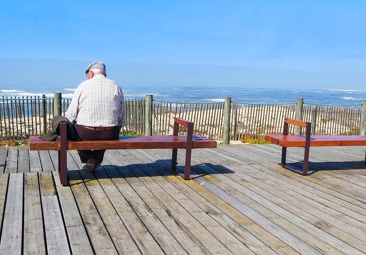 Friendly local having lunch by the sea