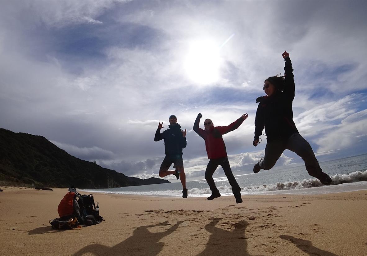 Jumping for joy whilst hiking on the track