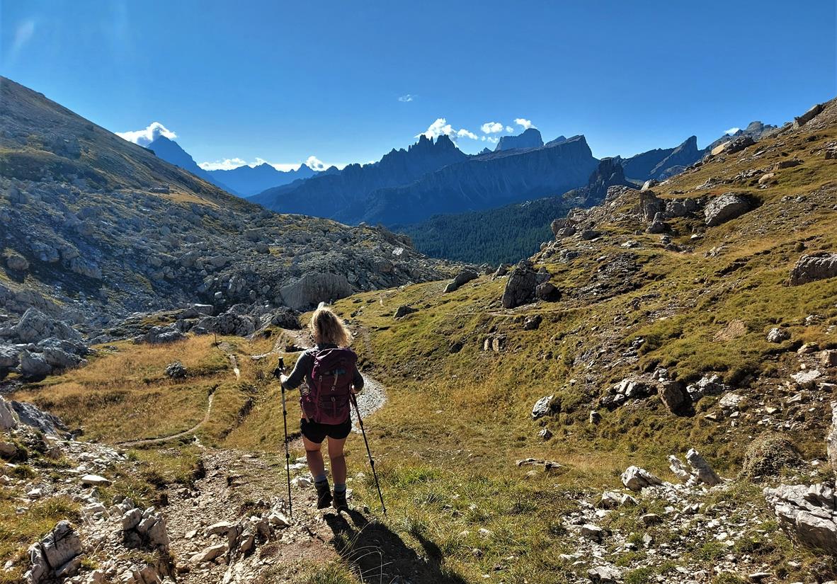 Hiker walking to Cortina