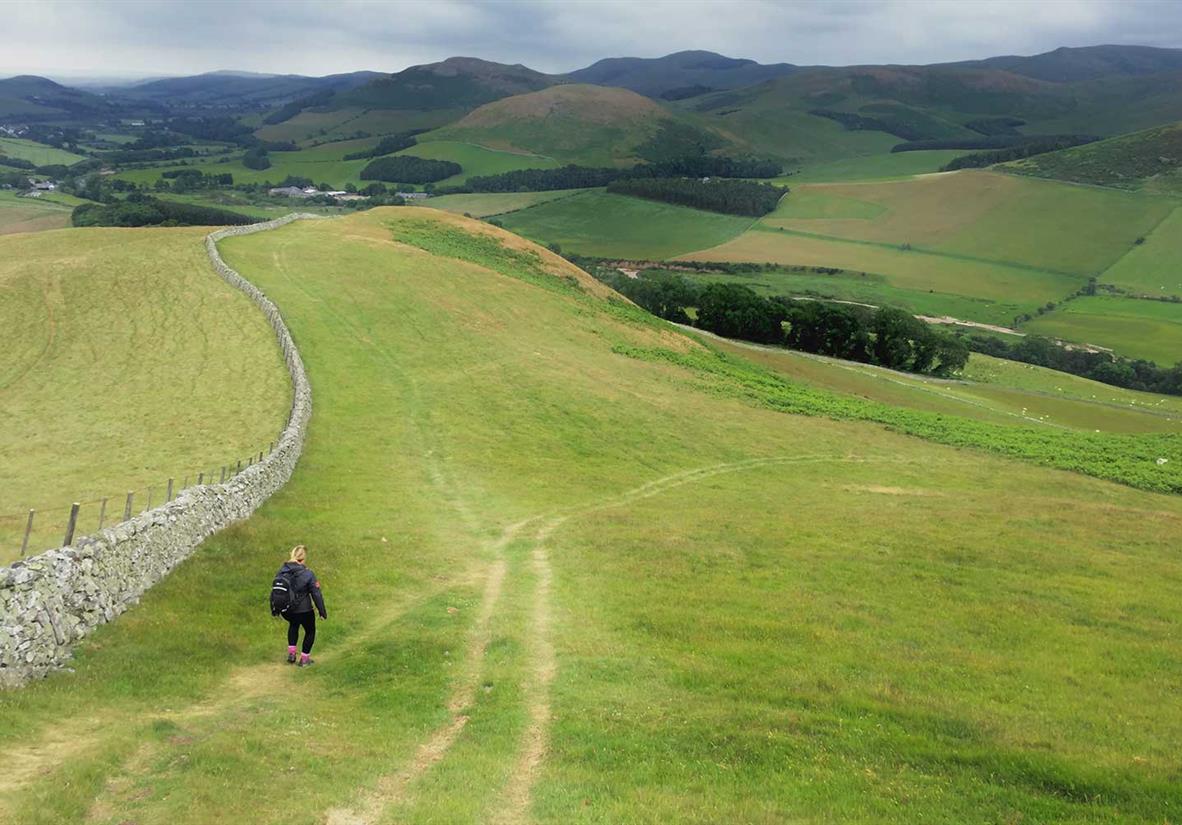 Descending a wide open hill