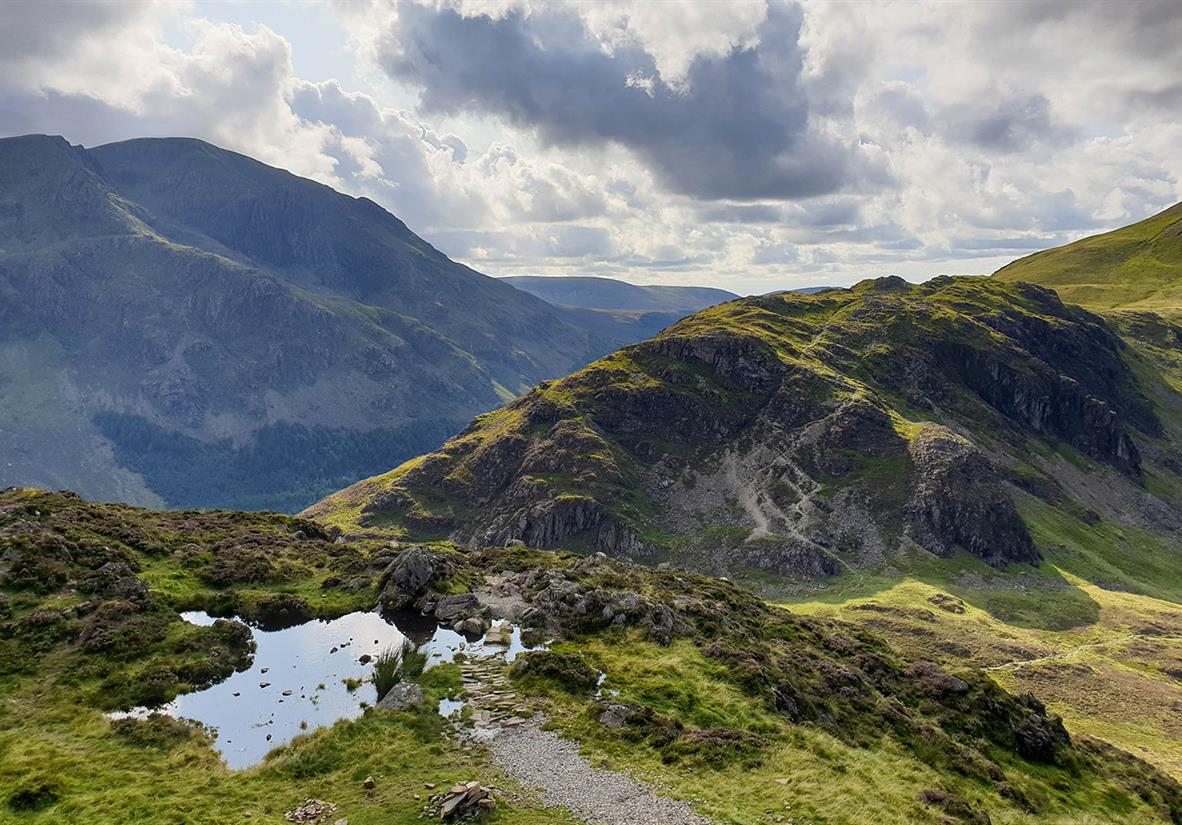 A craggy path weaving through the fells